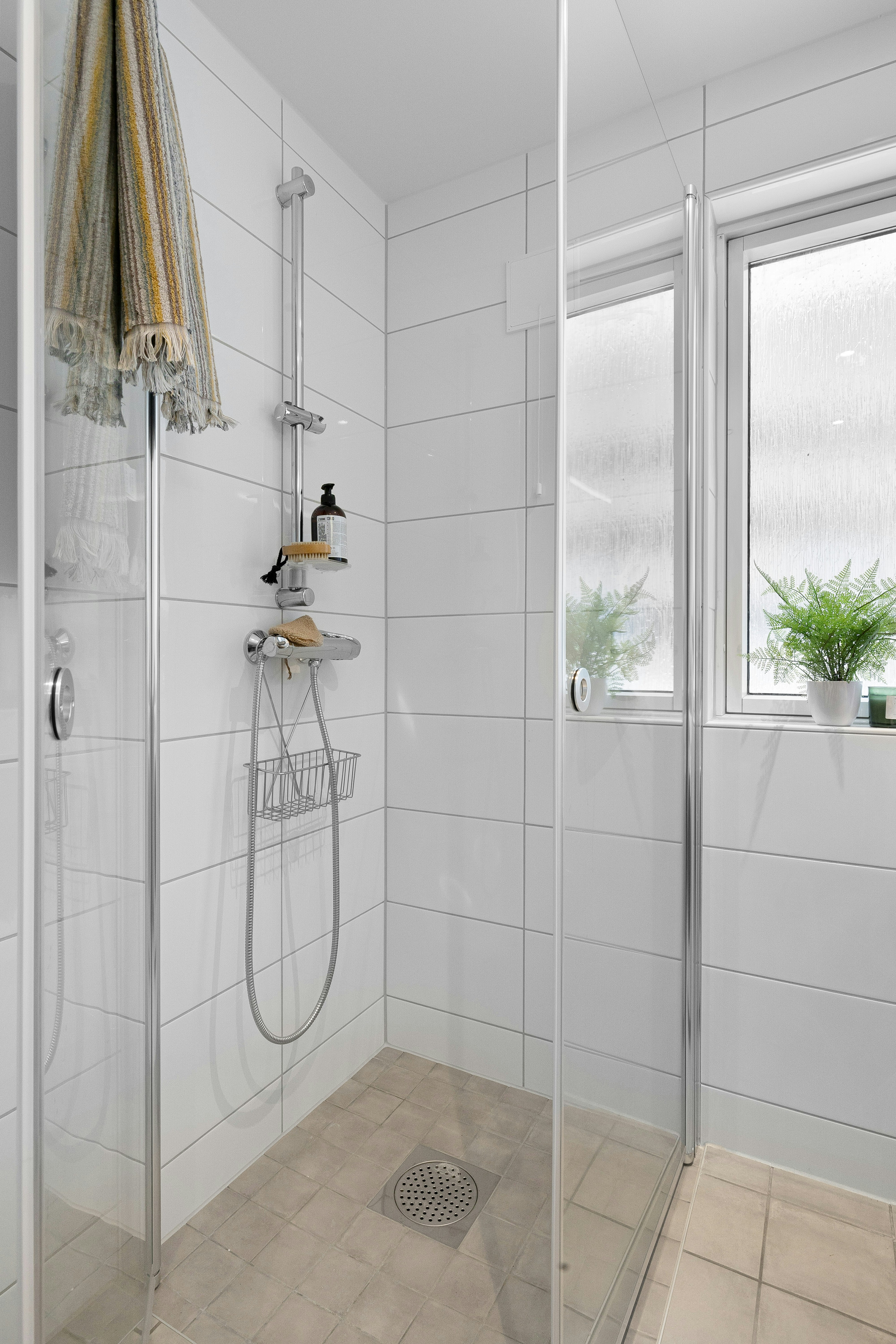 Luxurious walk‑in shower in master bathroom renovation